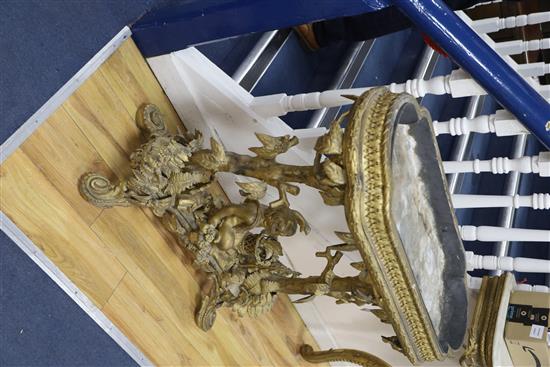 A Victorian carved giltwood and gesso jardinière table, child and trees underframe, W.83cm